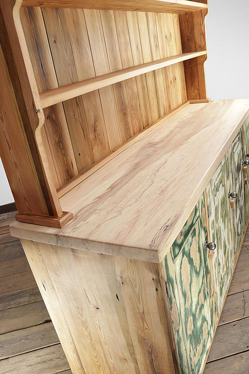 a stunning wholly-reclaimed dresser with patch-paint doors antique pine upper and a devinely figured solid beech-wood top
