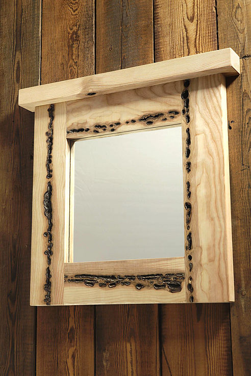 a stylish burr-ash wood square inset mirror with integral top shelf