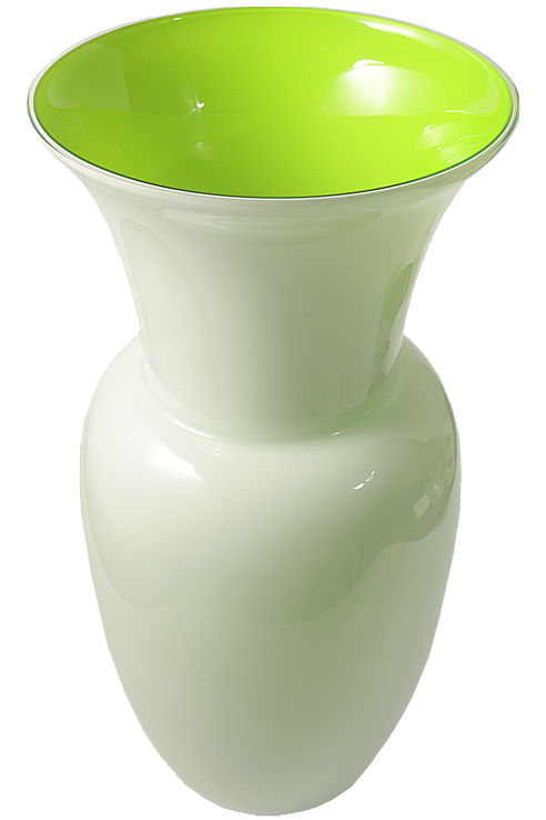 A dramatic Morano glass vase with a translucent white exterior and striking lime green interior