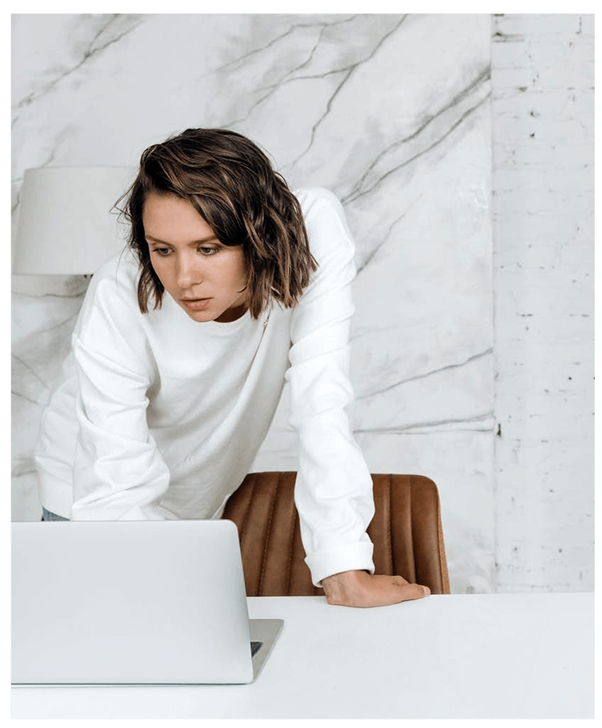 Young lady looking at a laptop