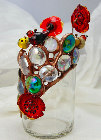 Recycled bottle cut and decorated with copper foil, lampwork and fusing